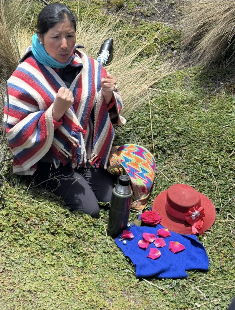 local Quechua guide performing the pagos a la tierra” ceremony