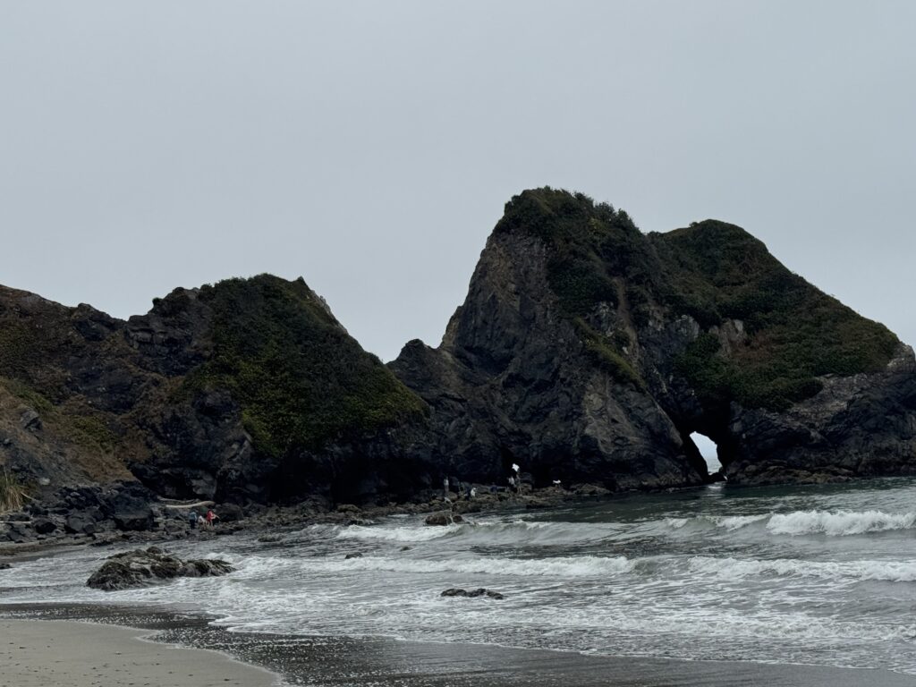 Secluded sandy beach and tidepools along Coastal Trail near Crescent Beach in Redwoods National Park