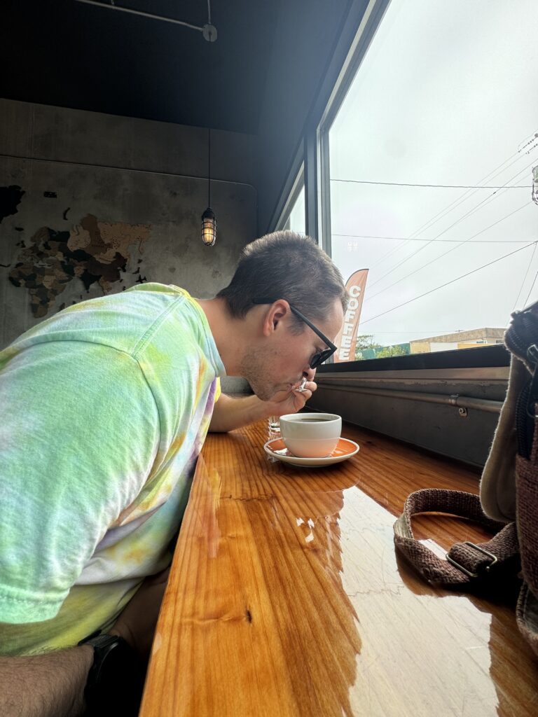 Sipping coffee at Paragon Coffee House.